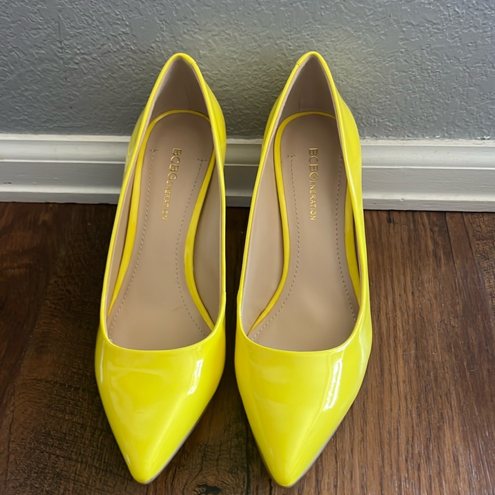 BCBG yellow pumps